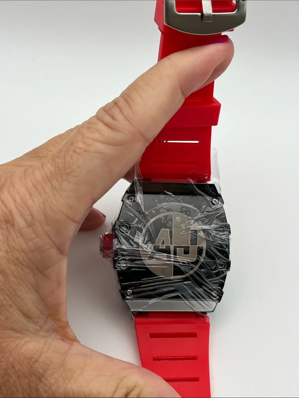 Red Skeleton-Style Sport Watch with Black Bezel